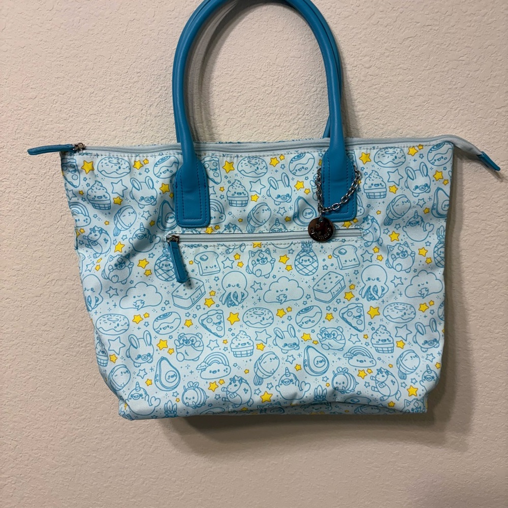 Squishable blue and yellow character print tote Approximately 17”x 12”. Like new